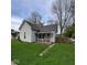 Exterior view of a charming house with a cozy front porch and well-maintained lawn at 1508 Monument St, Noblesville, IN 46060