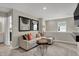 Cozy living room featuring neutral tones, plush seating, and stylish decor, perfect for relaxation and entertainment at 15334 Swallow Falls Way, Fishers, IN 46037