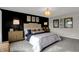 Serene primary bedroom with sophisticated decor, a large bed, and ample space for comfortable living at 15334 Swallow Falls Way, Fishers, IN 46037