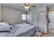 This bedroom features a comfortable bed, closet space, and natural lighting at 1643 E Tabor St, Indianapolis, IN 46203