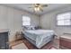 Relaxing bedroom with natural light, a comfortable bed, and cozy decor at 1643 E Tabor St, Indianapolis, IN 46203