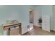 This bedroom has a spacious layout, storage units, and a door to another room at 1643 E Tabor St, Indianapolis, IN 46203