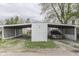 Carport providing covered parking, located next to the fenced backyard at 1643 E Tabor St, Indianapolis, IN 46203