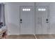 Welcoming entryway with a door, light walls, and modern door hardware at 1643 E Tabor St, Indianapolis, IN 46203
