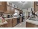 Functional kitchen with wood cabinets, modern appliances, and an open layout at 1643 E Tabor St, Indianapolis, IN 46203