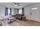 Bright living room with hardwood floors, natural light, and comfortable seating at 1643 E Tabor St, Indianapolis, IN 46203