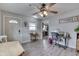 Inviting living room with a desk, wood flooring, neutral paint, and ample natural light at 1643 E Tabor St, Indianapolis, IN 46203