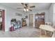 The living space includes a desk, dresser, and a door leading to another room at 1643 E Tabor St, Indianapolis, IN 46203