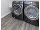 Modern laundry room features stainless steel Samsung washer and dryer set at 192 Lynnette Way, Cumberland, IN 46229