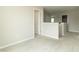 Neutral loft space with a doorway to a room with an ensuite bathroom at 192 Lynnette Way, Cumberland, IN 46229