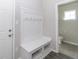 Functional mudroom with a hall tree and a convenient half bathroom nearby at 192 Lynnette Way, Cumberland, IN 46229