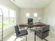 Bright home office with neutral carpet, modern desk, and ample natural light at 192 Lynnette Way, Cumberland, IN 46229