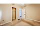 Bedroom view showing closet with shelving, doorway, and electrical outlets at 21 N Bosart Ave, Indianapolis, IN 46201
