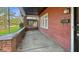 Side view of the front porch and front of the house at 21 N Bosart Ave, Indianapolis, IN 46201