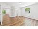 Open bedroom with wood flooring and views of backyard at 2327 Mimosa Ln, Anderson, IN 46011