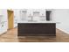Kitchen island featuring a stone countertop and stylish wood finish at 2327 Mimosa Ln, Anderson, IN 46011