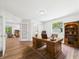 Bright office with wood desk and built-in shelves plus outdoor views at 2327 Mimosa Ln, Anderson, IN 46011