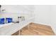 White wire shelving in the pantry for easy storage at 2327 Mimosa Ln, Anderson, IN 46011