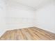 Walk in closet with built in wire racks, and wood-look floors at 2327 Mimosa Ln, Anderson, IN 46011