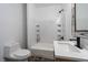 Neat bathroom boasting a shower-tub combination, contemporary vanity, and essential fixtures for a practical design at 2402 N B St, Elwood, IN 46036