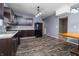 Spacious kitchen featuring dark cabinets, stainless appliances, and modern flooring at 2402 N B St, Elwood, IN 46036