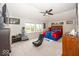 Cozy bedroom featuring a ceiling fan and natural light from large windows at 2432 Scarlet Oak Dr, Avon, IN 46123