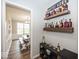 Side view into dining area with rustic decor and plenty of natural light from a large window at 2432 Scarlet Oak Dr, Avon, IN 46123