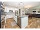 Modern kitchen with a large island, stainless steel appliances, and open layout at 2432 Scarlet Oak Dr, Avon, IN 46123