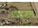 Aerial view of large property with outlined lot, home, and surrounding trees at 2450 S Us 421, Zionsville, IN 46077