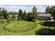 Aerial view of a horse property with a large grassy round pen at 2450 S Us 421, Zionsville, IN 46077