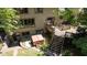 A secluded backyard featuring a deck, hot tub, and mature landscaping at 2450 S Us 421, Zionsville, IN 46077