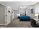 Comfortable bedroom with neutral walls, cozy carpet, and a well-lit workspace at 2450 S Us 421, Zionsville, IN 46077