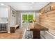 The dining area has custom wood wall accents and a view of the back deck at 2450 S Us 421, Zionsville, IN 46077