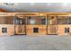 Well-maintained horse stalls with metal bars and wood walls, perfect for equestrian enthusiasts at 2450 S Us 421, Zionsville, IN 46077
