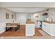 Charming kitchen features a dining area, stainless fridge, and plenty of storage space at 2450 S Us 421, Zionsville, IN 46077