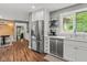 This kitchen features stainless appliances and flows into the dining area at 2450 S Us 421, Zionsville, IN 46077