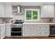 This recently remodeled kitchen offers stainless steel appliances and backyard views at 2450 S Us 421, Zionsville, IN 46077
