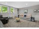 Spacious living room with neutral decor, comfortable seating, and ample natural light at 2450 S Us 421, Zionsville, IN 46077