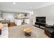 Open-concept living room featuring a cozy seating area and kitchenette for easy entertaining at 2450 S Us 421, Zionsville, IN 46077