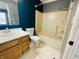 Bathroom features a tub/shower combination and single sink vanity at 261 Punkin Ct, Greenfield, IN 46140