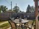 Cozy backyard with fenced in yard and mature trees at 2630 Wedgewood Dr, Columbus, IN 47203
