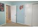Bedroom with a view into the hallway and closet at 2630 Wedgewood Dr, Columbus, IN 47203