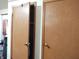 Image of a brown closet door that is slightly ajar and next to a second closet in this bedroom at 2630 Wedgewood Dr, Columbus, IN 47203