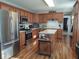 Modern kitchen with stainless steel appliances and a kitchen island at 2630 Wedgewood Dr, Columbus, IN 47203