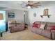 Spacious living room with neutral walls, comfortable seating, and plenty of natural light at 2630 Wedgewood Dr, Columbus, IN 47203