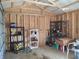 Interior view of a shed showcasing shelving and storage space with exposed framing at 2630 Wedgewood Dr, Columbus, IN 47203