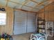 The shed's interior features an open garage door and exposed framing on the walls at 2630 Wedgewood Dr, Columbus, IN 47203