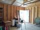 Inside the shed with exposed framing, a back door, and ample open storage space at 2630 Wedgewood Dr, Columbus, IN 47203