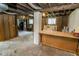 Unfinished basement area with exposed ductwork and concrete flooring at 300 E 2Nd St, Sheridan, IN 46069