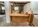 Unfinished basement with exposed ductwork and small storage area at 300 E 2Nd St, Sheridan, IN 46069